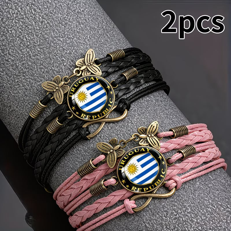 Set 2 Pulseras Uruguay Republic | Cuero Trenzado y Dije Bandera | Negro y Rosa | Unisex
