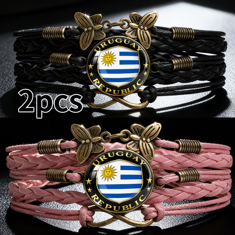 Set 2 Pulseras Uruguay Republic | Cuero Trenzado y Dije Bandera | Negro y Rosa | Unisex